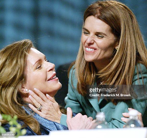 Queen Noor and Maria Shriver greet each other during the California Governor's Conference on Women and Families at the Long Beach Convention Center...