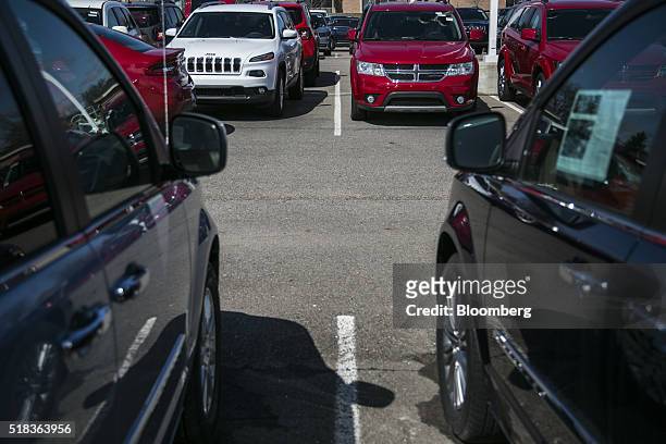 Vehicles sit on display at Suburban Chrysler Dodge Jeep Ram of Troy car dealership in Troy, Michigan, U.S., on Friday, March 25, 2016. Ward's...