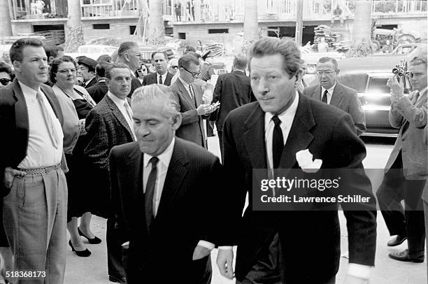 American actor Danny Kaye arrives at a memorial service for producer Mike Todd at Temple Israel of Hollywood , Los Angeles, California, 1958.