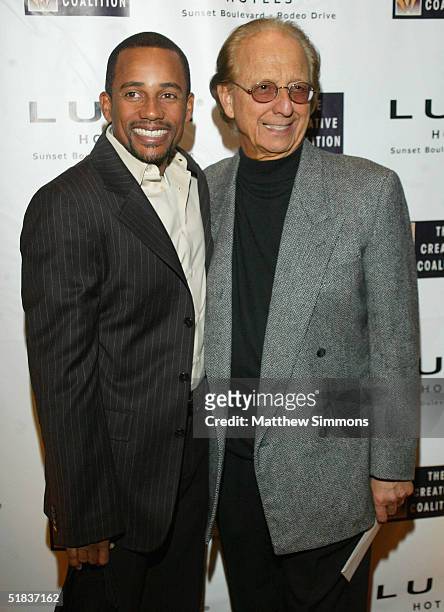 Actor Hill Harper and Norby Walters arrive at the Creative Coalition Spotlight Awards at the Luxe Hotel Sunset Boulevard on December 7, 2004 in Los...