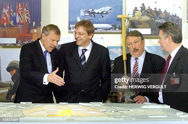From L-R, NATO Secretary General Jaap de Hoop Scheffer, Belgian Prime Minister Guy Verhofstadt, Defence Minister Andre Flahaut and Foreign Minister...