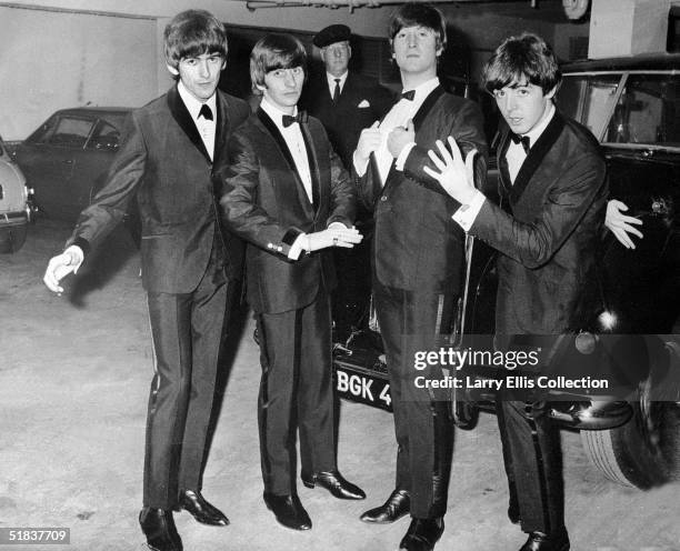 The Beatles together in an underground car park before the premiere of their film 'A Hard Day's Night' at the London Pavilion, 7th July 1964. The...