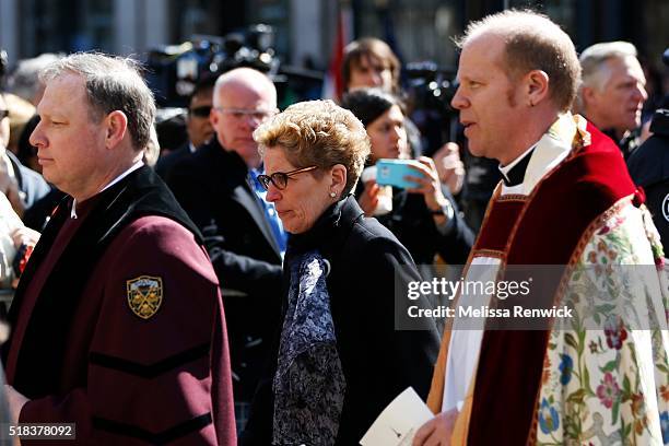 Kathleen Wynne enters St. James Cathedral where Rob Ford's funeral is being held, in Toronto.