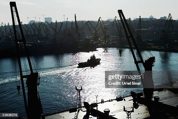 Cargo ships ply their trade, December 8, 2004 in the Ukranian port city of Odessa. Situated at the crossroads of several of the world's major trading...
