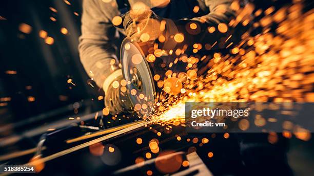 industrial worker with work tool - electric saw stock pictures, royalty-free photos & images