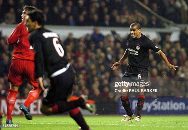Olympiakos CFP's Rivaldo watches his free kick hit the back of the net to make it 1-0 against Liverpool during their UEFA Champions League clash at...