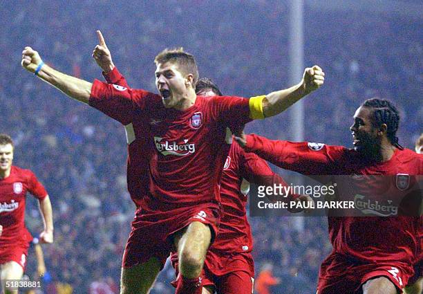 Liverpool's Steven Gerard celebrates scoring to make it 3-1 against Olympiacos CFP during their UEFA Champions League clash at Anfield, Liverpool, 08...