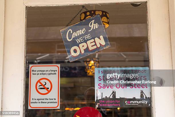 Save Our Steel' poster adorns a cafe window in Port Talbot on March 31, 2016 in Port Talbot, Wales. Indian owners Tata Steel has put its British...