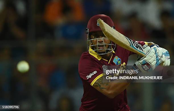 West Indies's Lendl Simmons plays a shot during the World T20 semi-final match between India and West Indies at The Wankhede Cricket Stadium in...