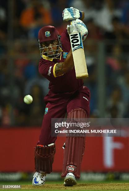 West Indies's Lendl Simmons plays a shot during the World T20 semi-final match between India and West Indies at The Wankhede Cricket Stadium in...