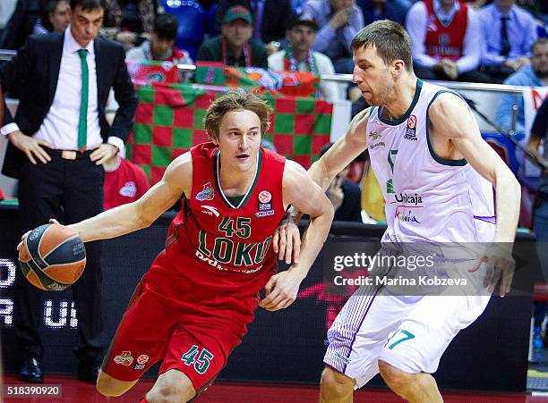 Ryan Broekhoff, #45 of Lokomotiv Kuban Krasnodar competes with Fran Vazquez, #17 of Unicaja Malaga during the 2015-2016 Turkish Airlines Euroleague...