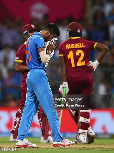 Hardik Pandya of India looks dejected after having Lendl Simmons of the West Indies caught off a no ball during the ICC World Twenty20 India 2016...