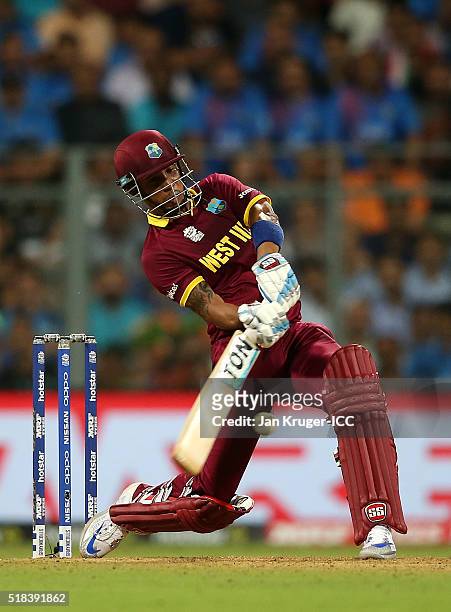 Lendl Simmons of West Indies hits out during the ICC World Twenty20 India 2016 Semi-Final match between West Indies and India at Wankhede Stadium on...