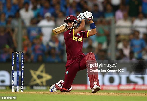 Lendl Simmons of West Indies hits out during the ICC World Twenty20 India 2016 Semi-Final match between West Indies and India at Wankhede Stadium on...