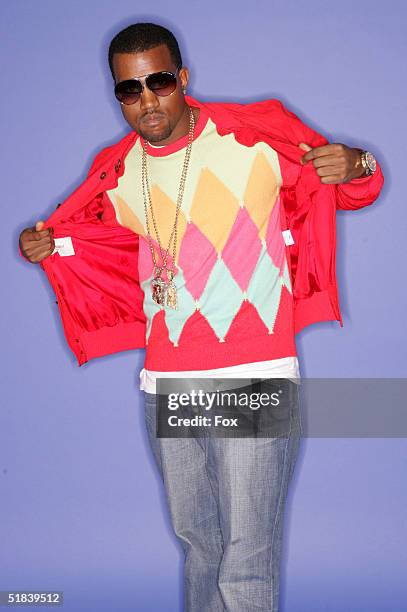 Rapper/producer Kanye West poses for a portrait during the 2004 Billboard Music Awards at the MGM Grand Garden Arena on December 8, 2004 in Las...