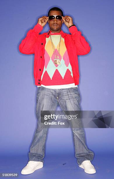 Rapper/producer Kanye West poses for a portrait during the 2004 Billboard Music Awards at the MGM Grand Garden Arena on December 8, 2004 in Las...