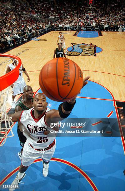 Marc Jackson of the Philadelphia 76ers rebounds against the Minnesota Timberwolves on December 8, 2004 at the Wachovia Center in Philadelphia,...