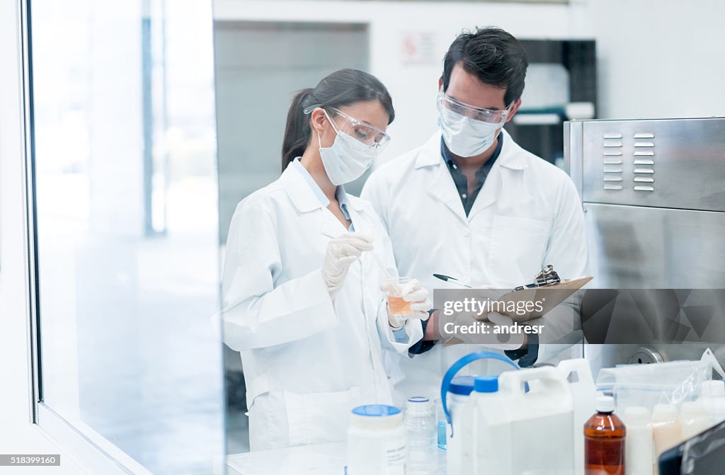Chemists working at a the lab