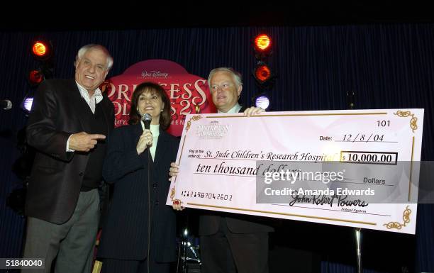 Director Garry Marshall, Terre Thomas and Ron Patterson stand with a $10,000 check for St. Jude Children's Research Hospital at "The Princess Diaries...