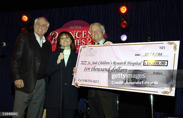 Director Garry Marshall, Terre Thomas and Ron Patterson stand with a $10,000 check for St. Jude Children's Research Hospital at "The Princess Diaries...