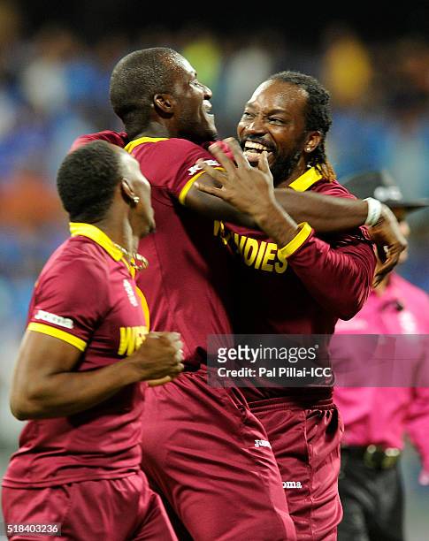 Mumbaj, INDIA Dwayne Bravo of the West Indies Darren Sammy, Captain of the West Indies and Chris Gayle of the West Indies celebrate after winning the...