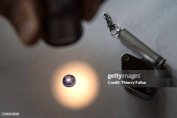 Star sapphire from Mogok. Due to the arrangement of rutile crystals at a specific angle, the stone has the property to display a six-ray star.