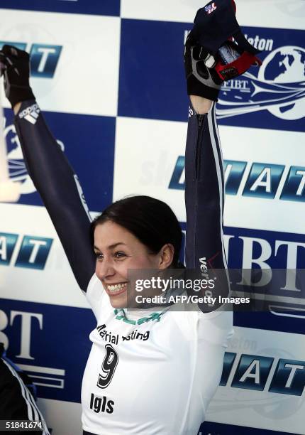 S Noelle Pikus-Pace celebrates on the podium after winning the Women's Skeleton World Cup competition in Innsbruck, 09 December 2004. AFP PHOTO/...