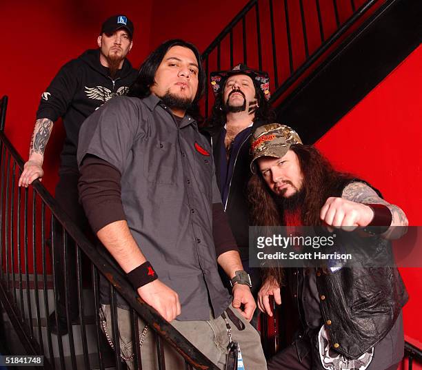 Heavy metal band Damageplan poses for a portrait backstage April 7, 2004 in Chicago, Illinois. Guitarist Dimebag Darrell , real name Darrell Abbott,...