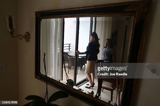 Wanda Bee , Real Estate consultant with Re/Max, shows a condo to prospective buyer, Gioconda Velez-Brooks, at the Brickell East condos on March 31,...
