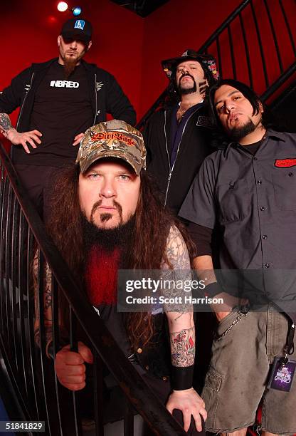 Heavy metal band Damageplan poses for a portrait backstage April 7, 2004 in Chicago, Illinois. Guitarist Dimebag Darrell , real name Darrell Abbott,...