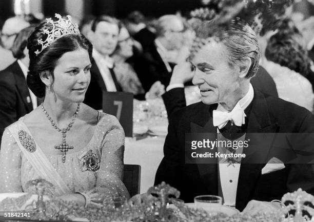 Queen Silvia of Sweden with Professor Sune Bergstrom, chairman of the Nobel Foundation at the Nobel Prize Banquet, Stockholm, 10th December 1976.