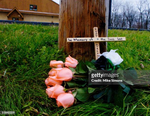 Makeshift memorial rests outside of the Alrosa Villa nightclub, the day after a gunman fired on the band Damageplan, December 9, 2004 in Columbus,...