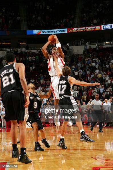 T Mac Rockets Tracy McGrady of the Houston Rockets shoots the game-winning 3-point ...