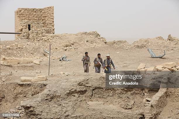 Soldiers of People's Resistance Forces, loyal to President of Yemen Abd Rabbuh Mansur Hadi, patrol after they recapture Baraqish ancient city from...