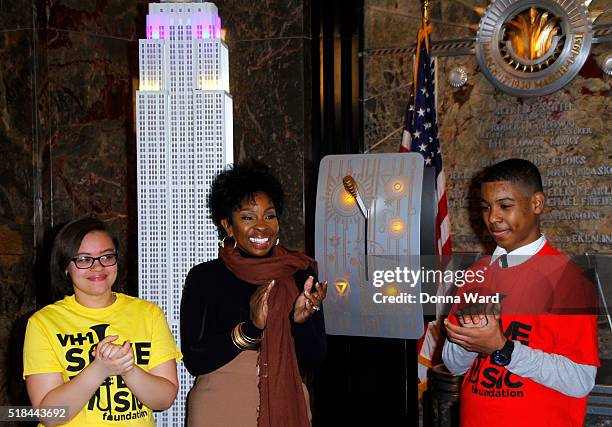 Lizbeth Concepcion, Gladys Knight and Christian Guzman appear with VH1 Save The Music Foundation to light The Empire State Building to close out...