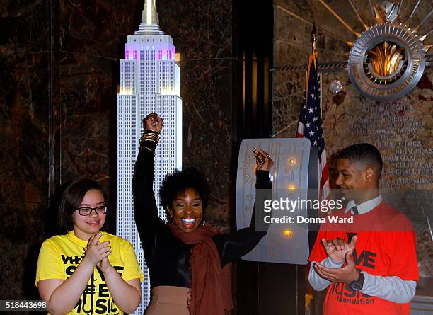 Lizbeth Concepcion, Gladys Knight and Christian Guzman appear with VH1 Save The Music Foundation to light The Empire State Building to close out...