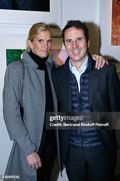 Ian Gallienne and his wife Segolene Frere Gallienne attend the 'Guy Bourdin - Portraits' - Exhibition Opening and Cocktail at Studio des Acacias on...