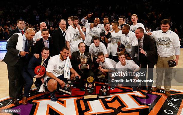 George Washington Colonials celebrates their victory over the Valparaiso Crusaders in the NIT Championship game at Madison Square Garden on March 31,...