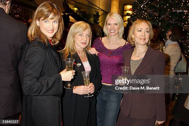 Presenter Katie Derham, actress Helen Lederer, TV presenter Anneka Rice and actress Paula Wilcox attend the Women's Working Lunch Party on December...