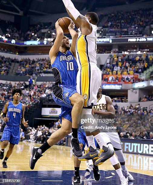 Evan Fournier of the Orlando Magic shoots the ball during the game against the Indiana Pacers at Bankers Life Fieldhouse on March 31, 2016 in...