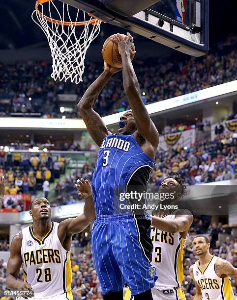 Dewayne Dedmon of the Orlando Magic dunks the ball during the game against the Indiana Pacers at Bankers Life Fieldhouse on March 31, 2016 in...