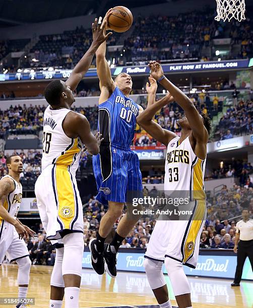 Aaron Gordon of the Orlando Magic shoots the ball during the game against the Indiana Pacers at Bankers Life Fieldhouse on March 31, 2016 in...