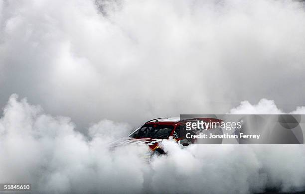 2004 sport pictures of the year - car racing stock pictures, royalty-free photos & images