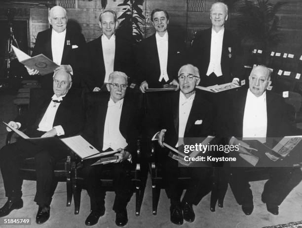 Eight Nobel Prize winners at the Stockholm Concert Hall, 10th December 1967. From left to right, they are Ronald Norrish, Manfred Eigen and George...