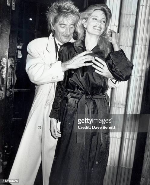 Singer Rod Stewart and girlfriend Kelly Emberg leave Langan's Brasserie.