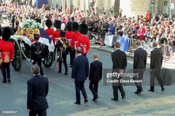 Prince Charles, Prince Harry, Earl Spencer, Prince William and Prince Philip, Duke of Edinburgh, follow the coffin of Diana The Princess of Wales...
