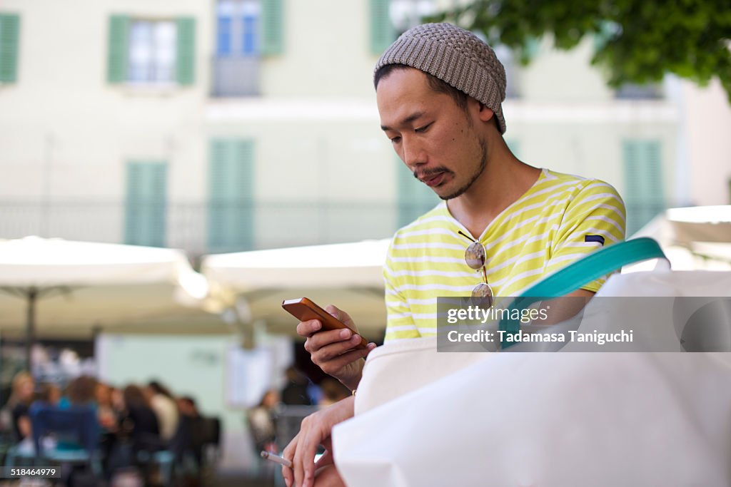 Man using smart phone