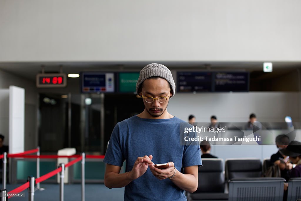 Man using smart phone