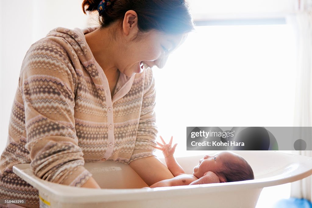 Mother taking care of her baby