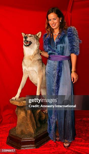 Jade Jagger poses in a Victorian-themed booth at the "Amnesty International - VIP Burlesque Party" at Canvas on November 25, 2004 in London. Thrown...